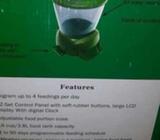 Automatic pond fish feeder